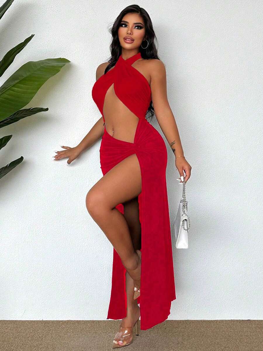 Sleeveless halter neck cut out maxi dress featuring a twist front, backless crisscross design, and split thigh slit.