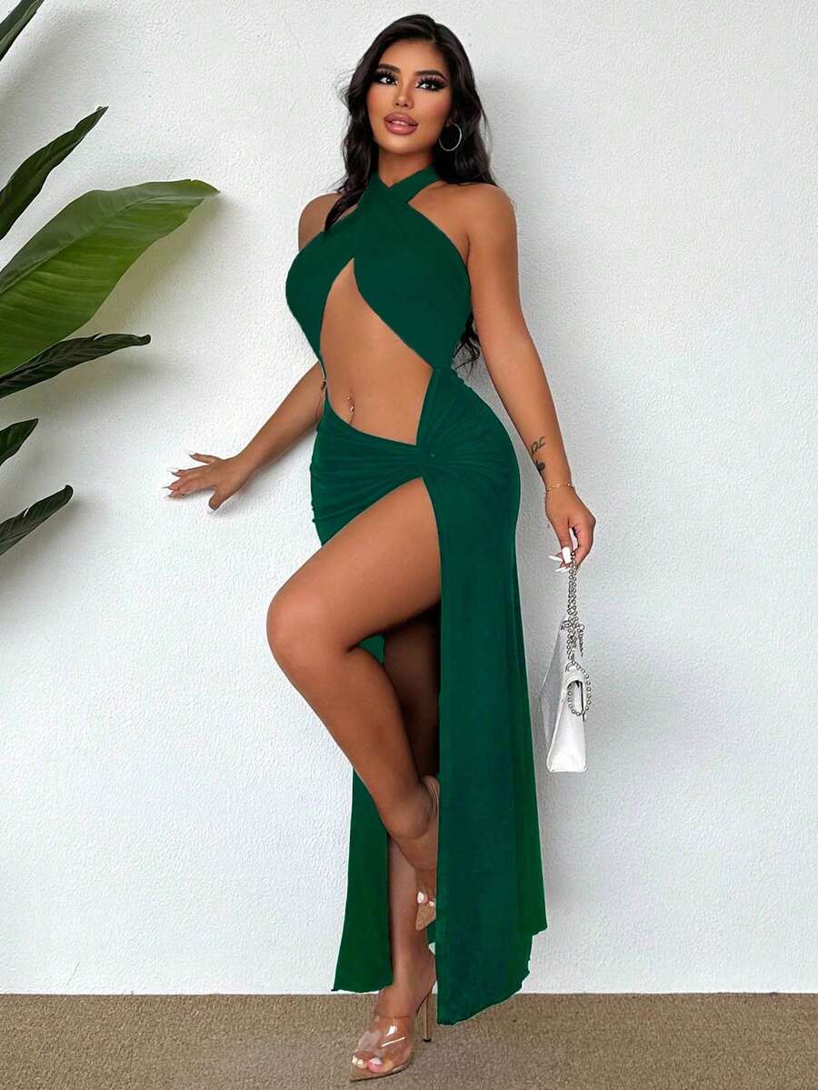 Sleeveless halter neck cut out maxi dress featuring a twist front, backless crisscross design, and split thigh slit.