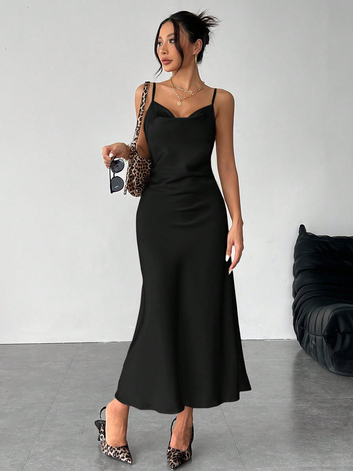Women's long apricot satin cami dress featuring a draped swing collar, spaghetti straps, backless zipper back, and mermaid hem.