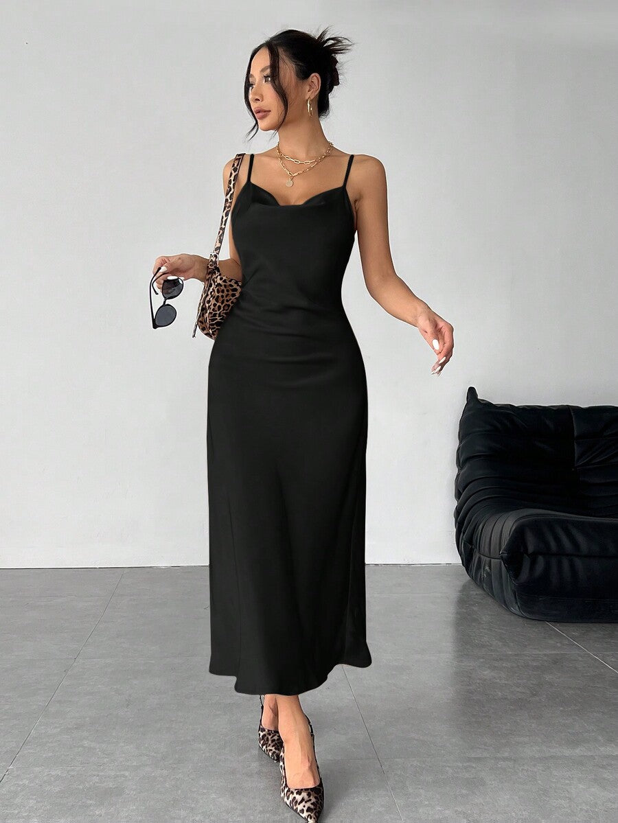 Women's long apricot satin cami dress featuring a draped swing collar, spaghetti straps, backless zipper back, and mermaid hem.