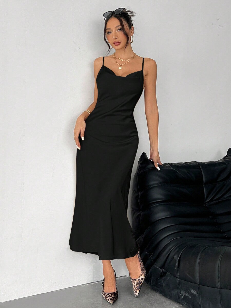 Women's long apricot satin cami dress featuring a draped swing collar, spaghetti straps, backless zipper back, and mermaid hem.