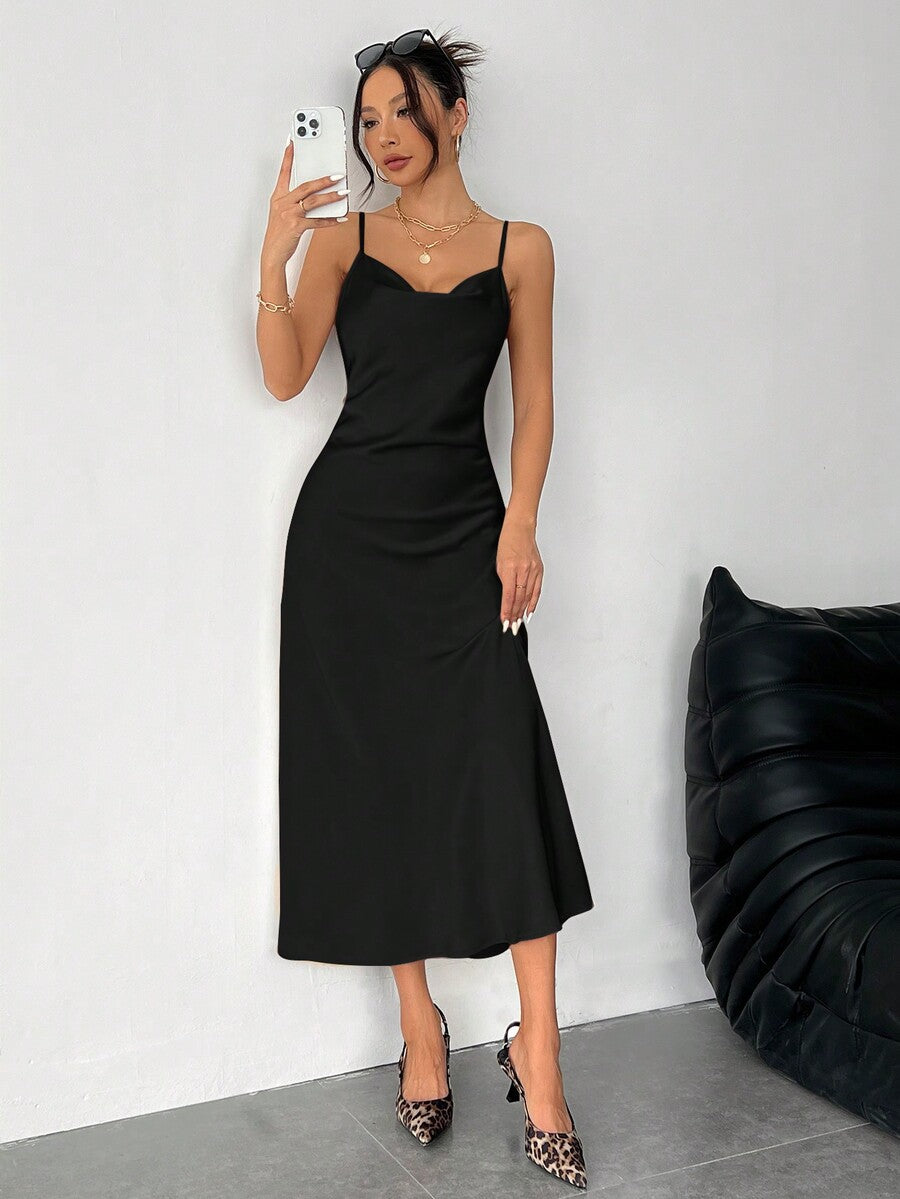 Women's long apricot satin cami dress featuring a draped swing collar, spaghetti straps, backless zipper back, and mermaid hem.