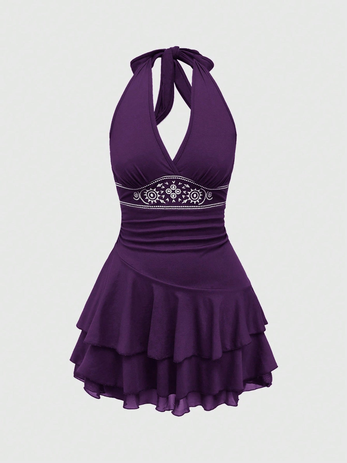 Women's sun totem embroidered sleeveless layered mini dress featuring a halter neck, backless tie back design, and slim fit high-waist A-line silhouette.