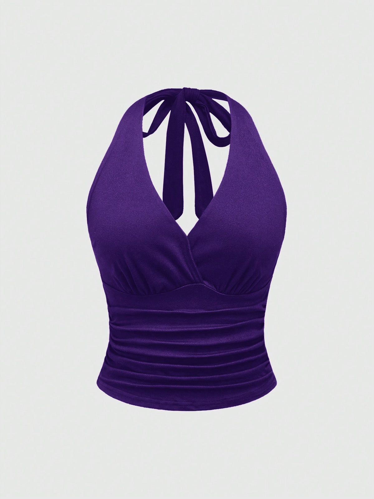 Women's halter crop tank top featuring a backless silhouette and ruched detailing in a slim fit design.