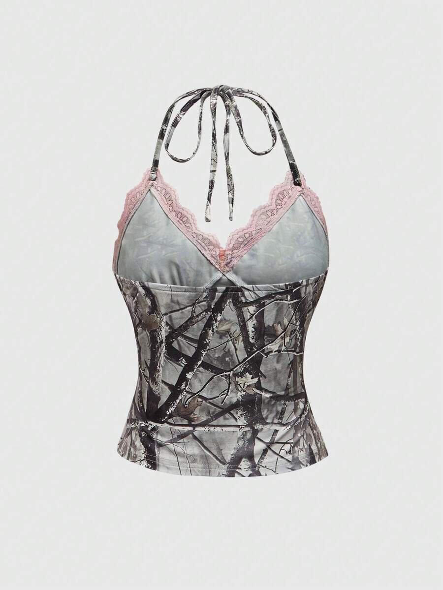 Women's slim fit camo crop tank top styled with contrast lace trim, front bow accent, and matching arm sleeves.