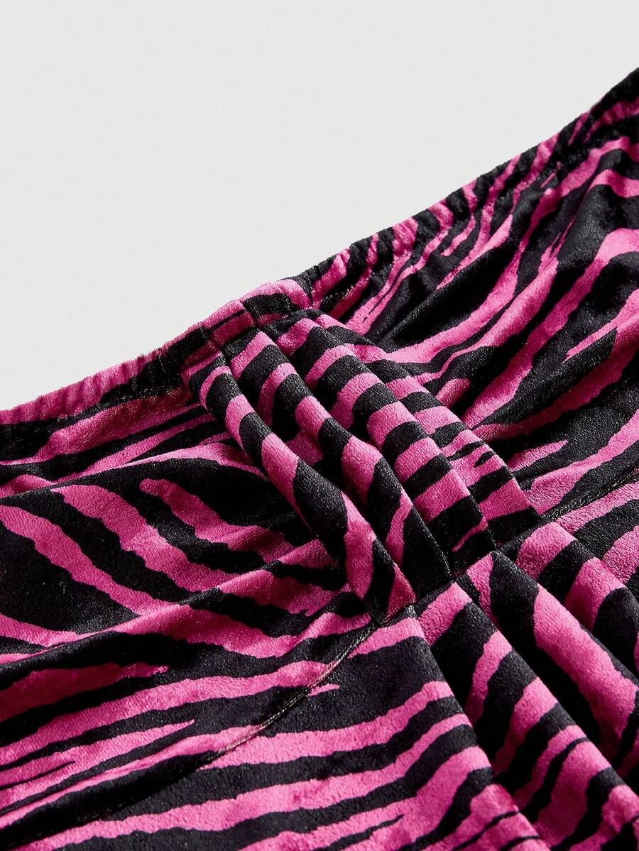 Women's hot pink ruched strapless tube top with flared hem and slim fit