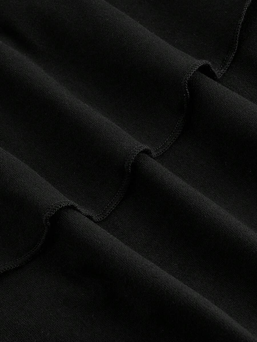Front view of women's black sleeveless halter mini dress featuring a backless slim fit silhouette and tiered ruffle hem.