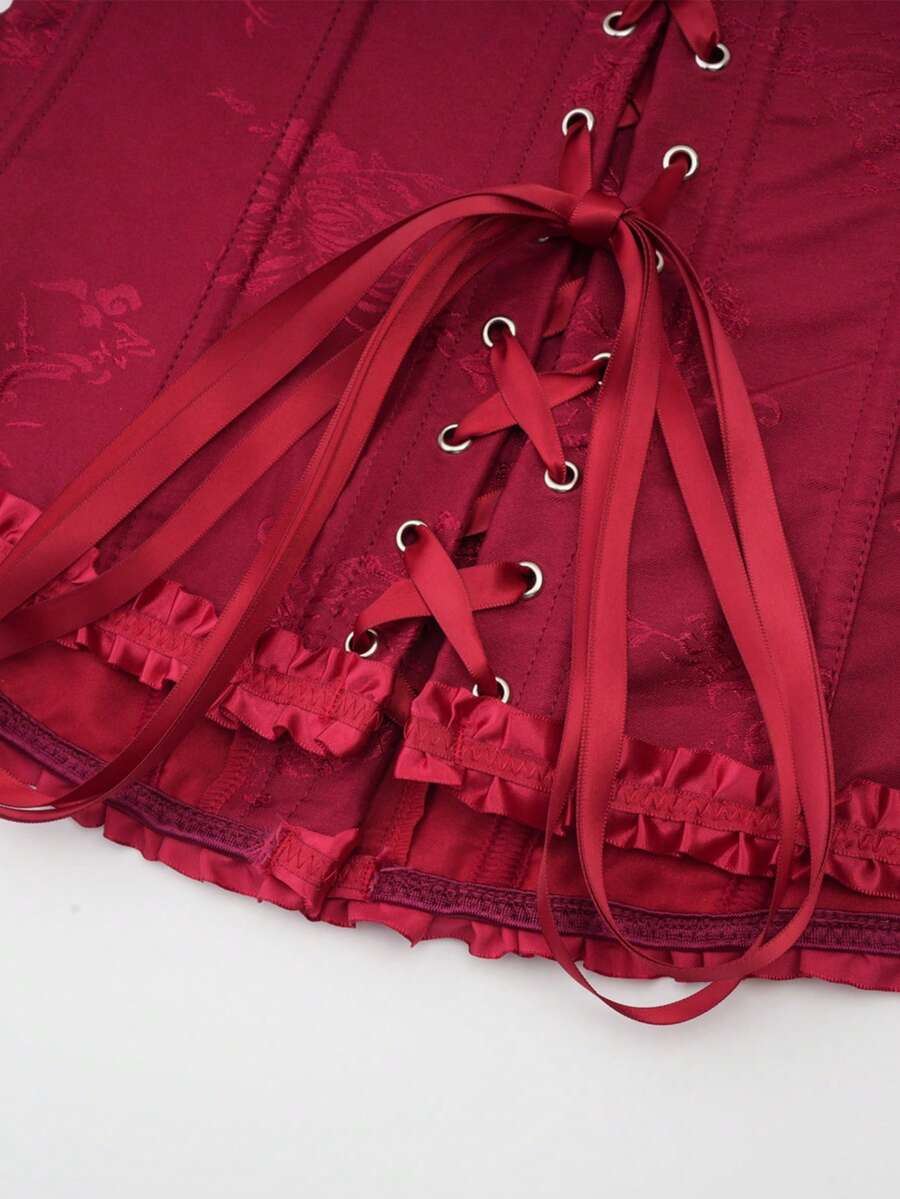 Women’s strapless corset bustier top with front button detail, lace-up back, frill accents, slim fit, and asymmetrical hem.