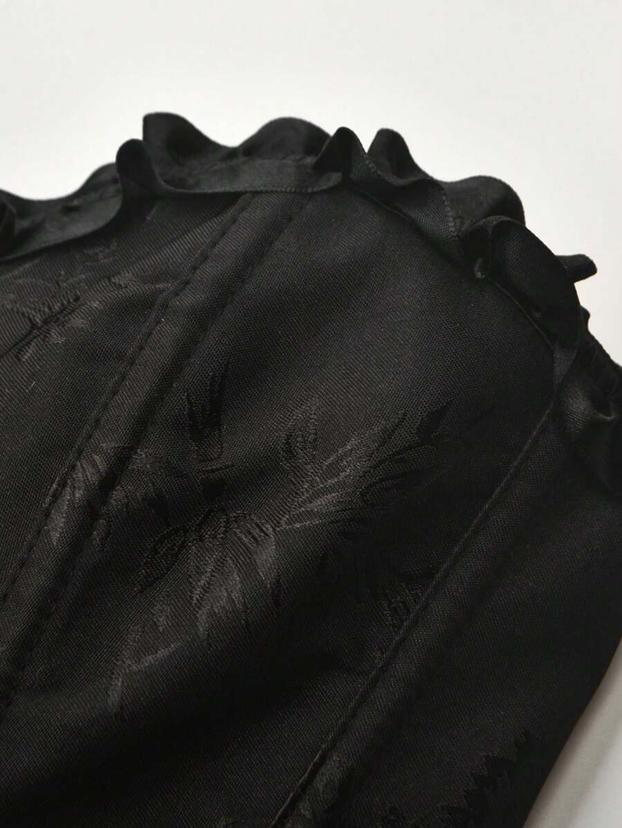 Women’s strapless corset bustier top with front button detail, lace-up back, frill accents, slim fit, and asymmetrical hem.
