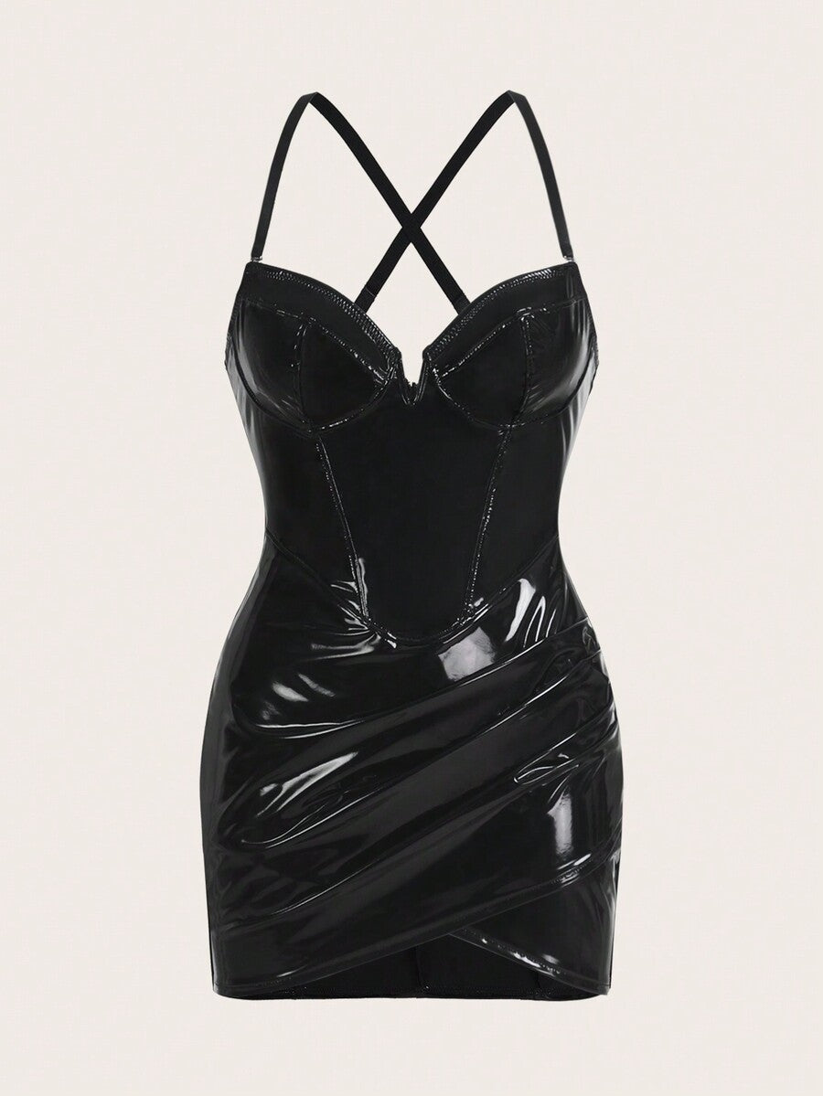 Women's black lace cami mini dress featuring spaghetti straps, a criss-cross backless design, and a slim fit pencil hem.