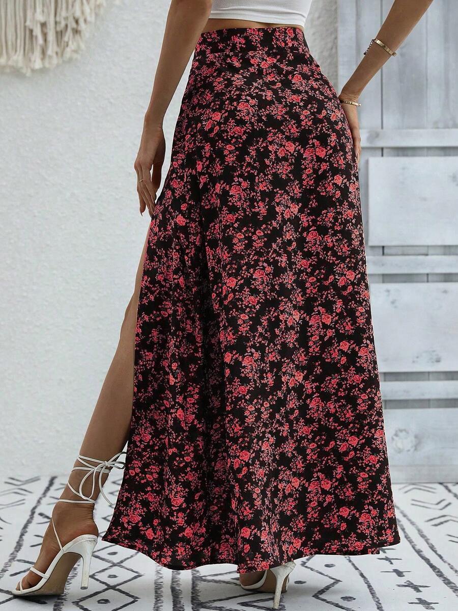 Women's black boho ditsy floral print maxi skirt featuring a high waist and a stylish split thigh slit detail.