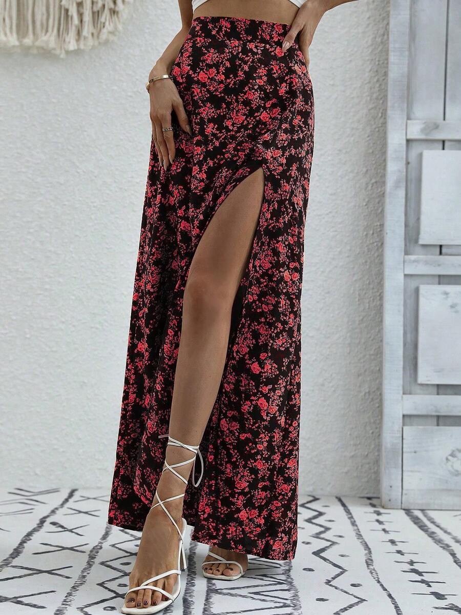 Women's black boho ditsy floral print maxi skirt featuring a high waist and a stylish split thigh slit detail.