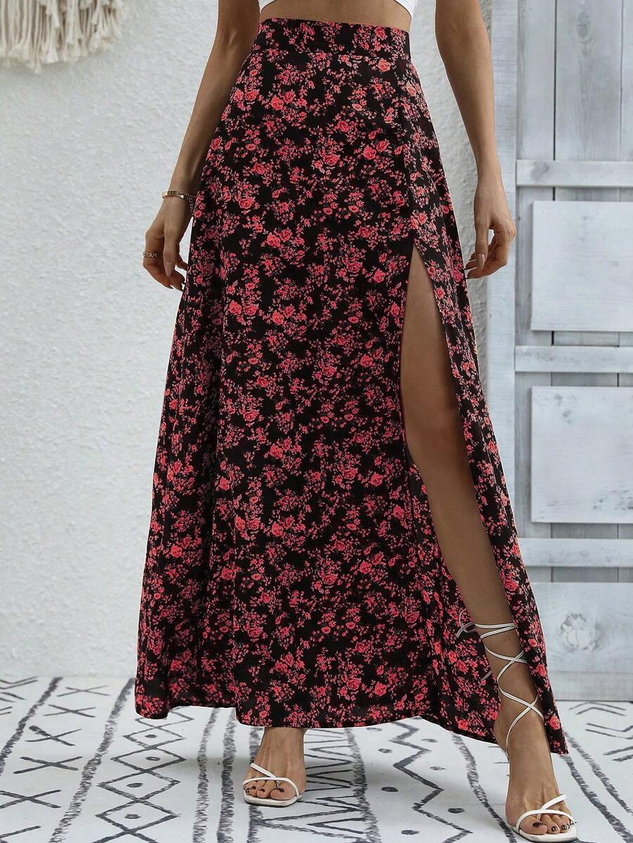 Women's black boho ditsy floral print maxi skirt featuring a high waist and a stylish split thigh slit detail.