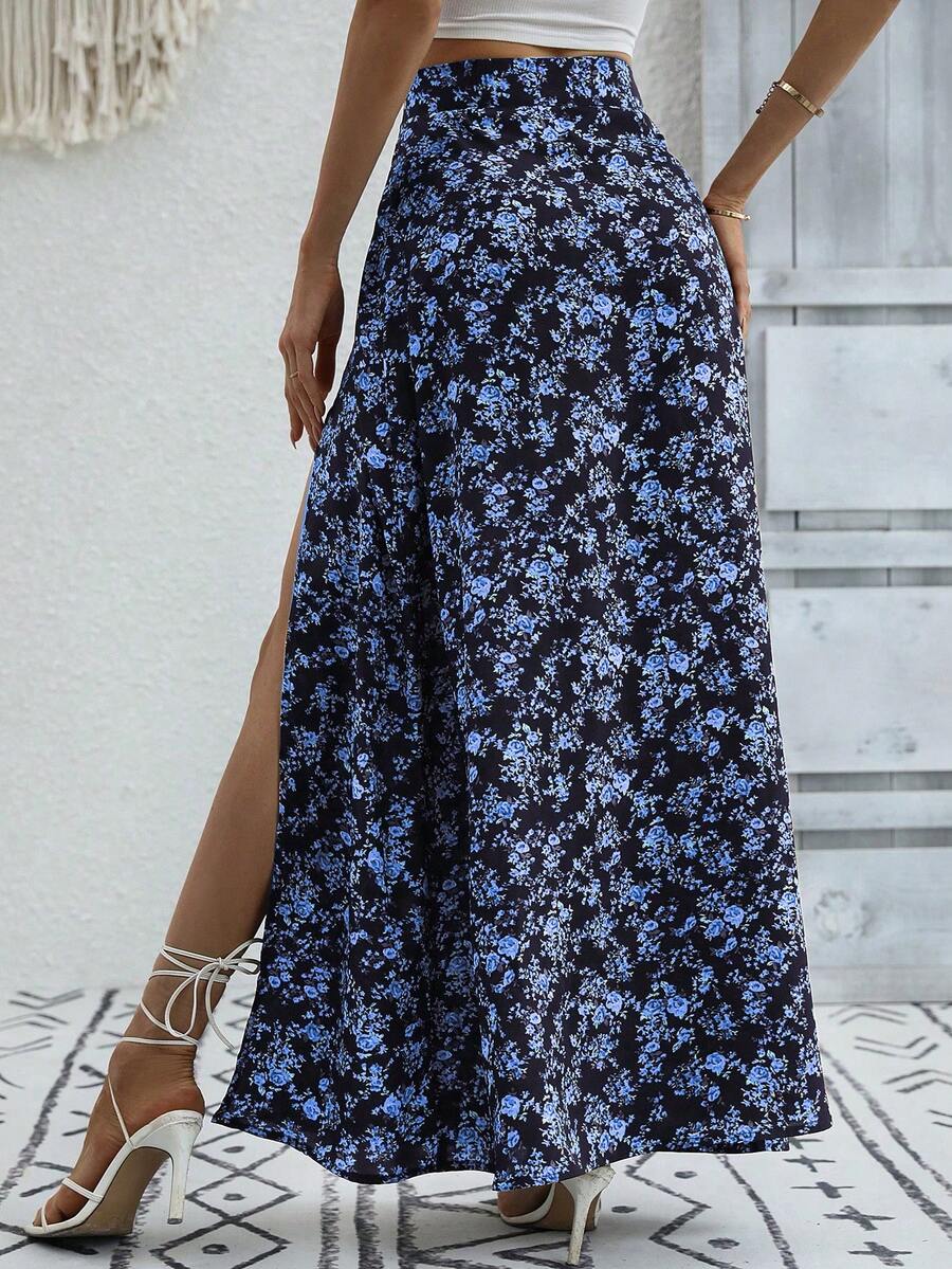 Women's black boho ditsy floral print maxi skirt featuring a high waist and a stylish split thigh slit detail.