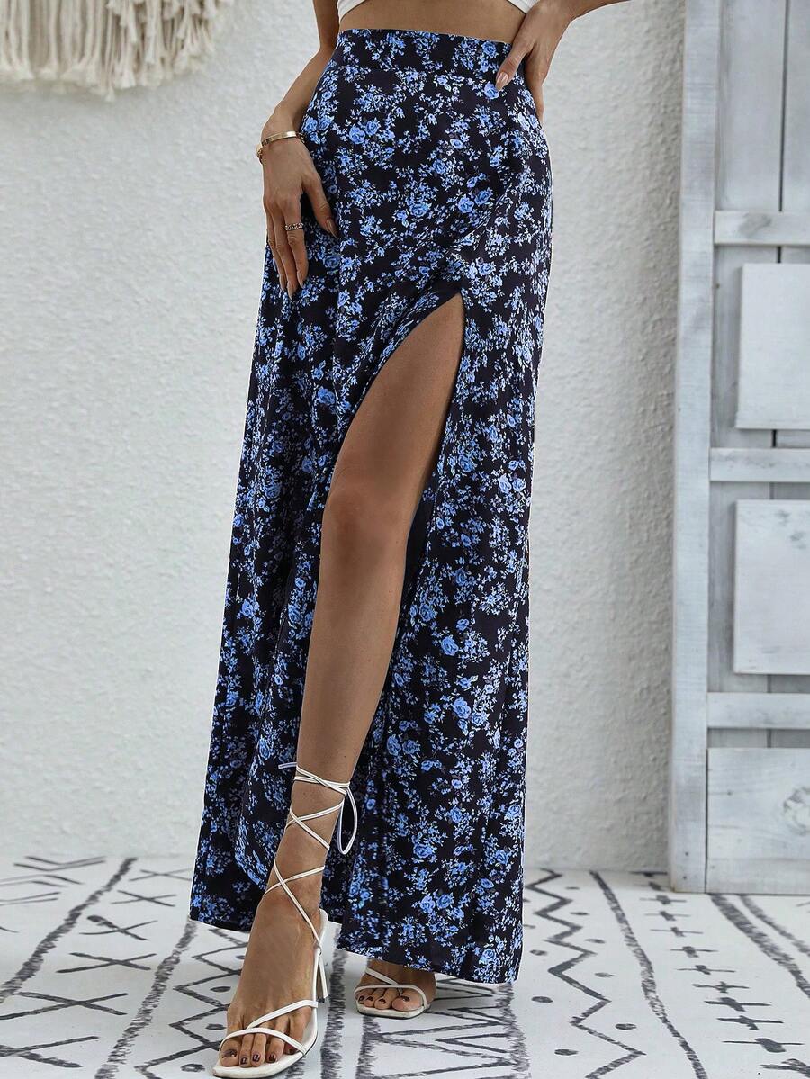 Women's black boho ditsy floral print maxi skirt featuring a high waist and a stylish split thigh slit detail.