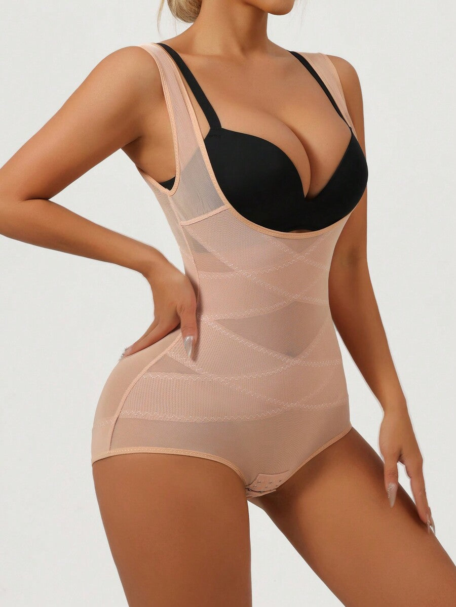 Apricot semi-sheer mesh shapewear bodysuit for women featuring a low-cut neckline, bust support, contrast mesh details, and Bermuda shorts length.