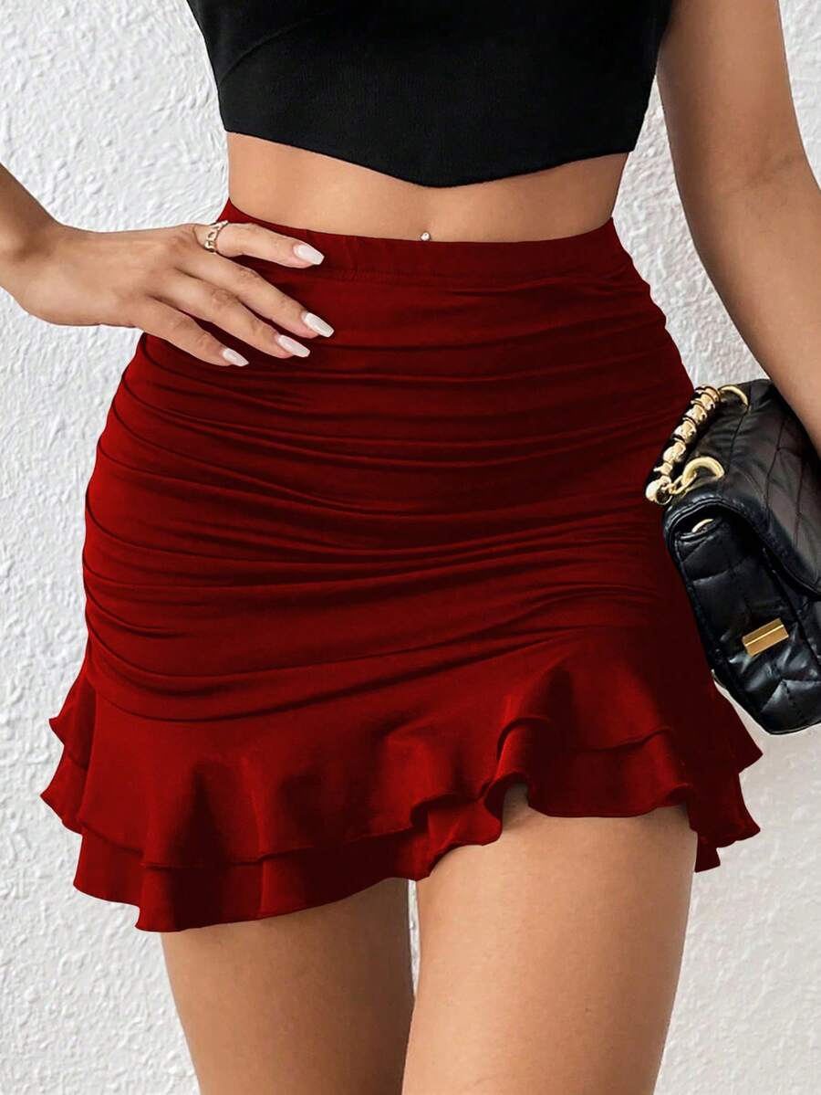 Black high waist ruched bodycon mini skirt featuring a tiered ruffle hem and skinny casual fit for women.