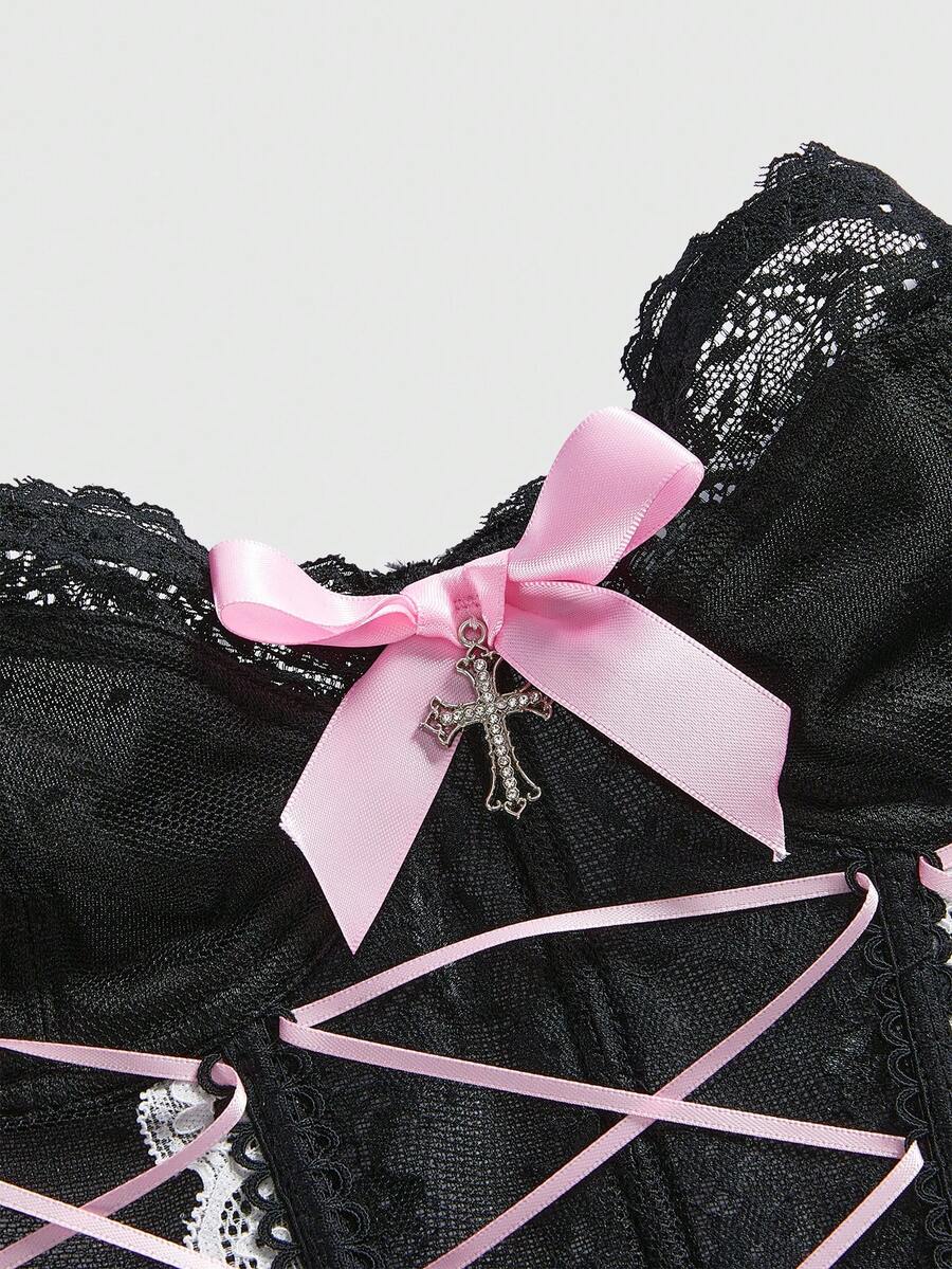 Pink mesh lace-up cami top featuring contrast lace trim, bow straps, and separate arm sleeves