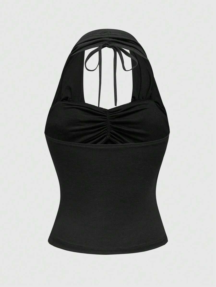 Women's draped neck halter tank top with ruched waist and backless cut-out detail