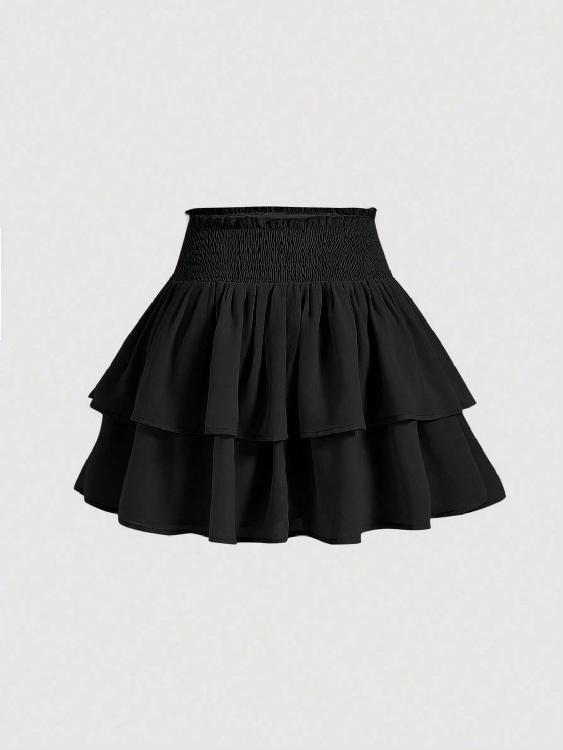Women's high waist tiered ruffle layered mini skort in black featuring shirred details and ruffle hem.