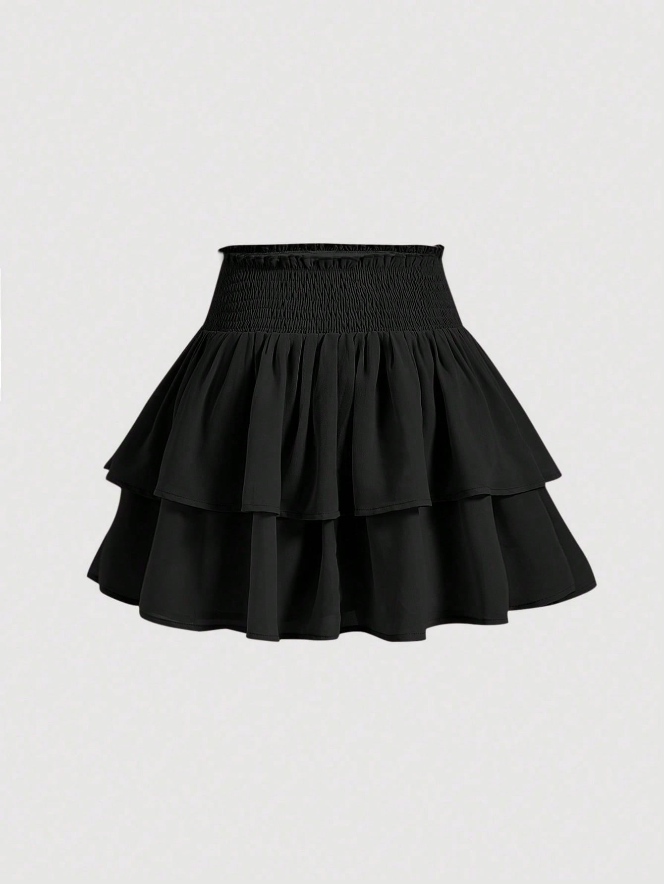 Women's high waist tiered ruffle layered mini skort in black featuring shirred details and ruffle hem.