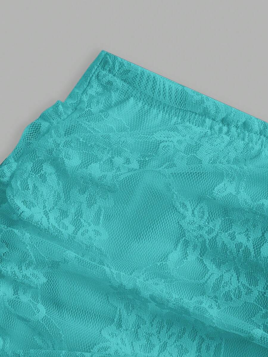 Women's black floral lace mini skirt featuring a ruched bodycon design, mid waist, and high stretch lined fabric.