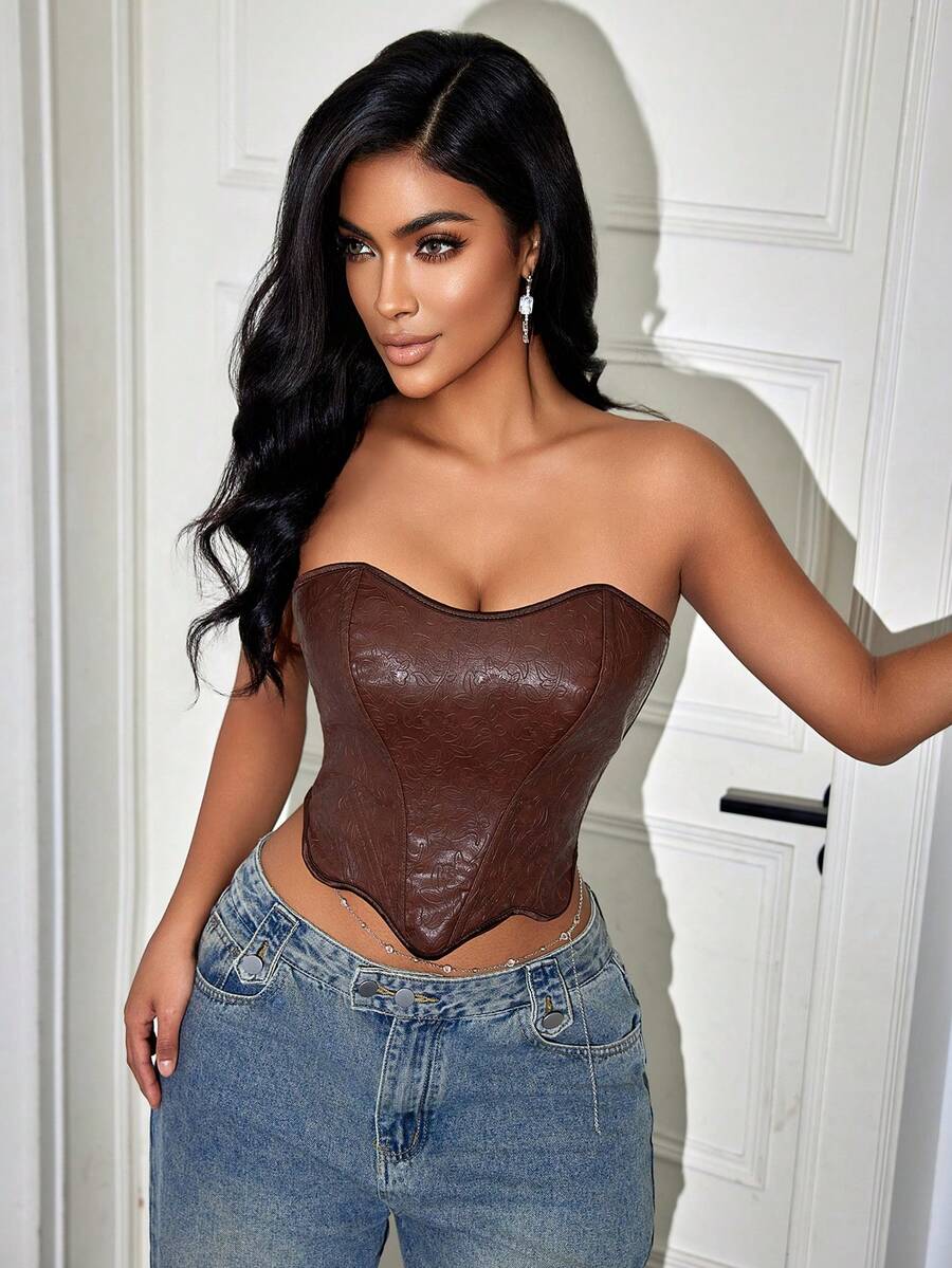 Brown vintage floral textured PU leather bustier crop top for women featuring a strapless backless design, steel boning, asymmetrical hem, and lace-up back detail.