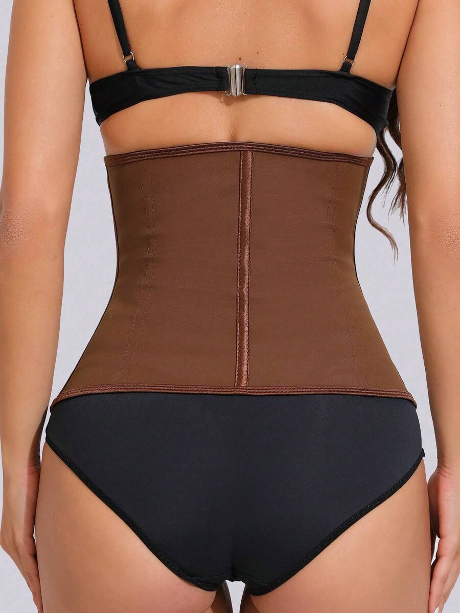 Women's latex waist trainer body shaper featuring zipper front closure and strong tummy support.