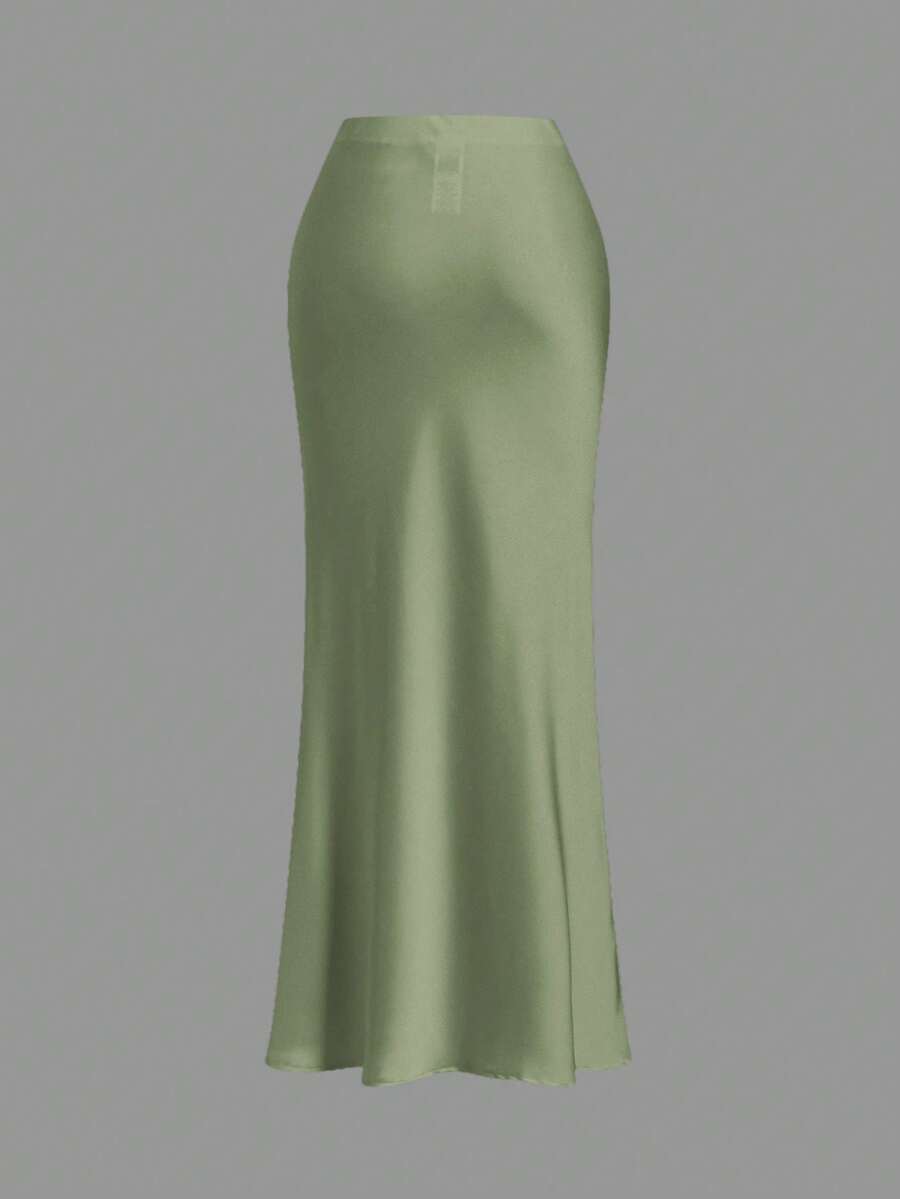 Women's black woven mermaid maxi skirt featuring a solid color design, mid waist, and 100% cotton fabric.