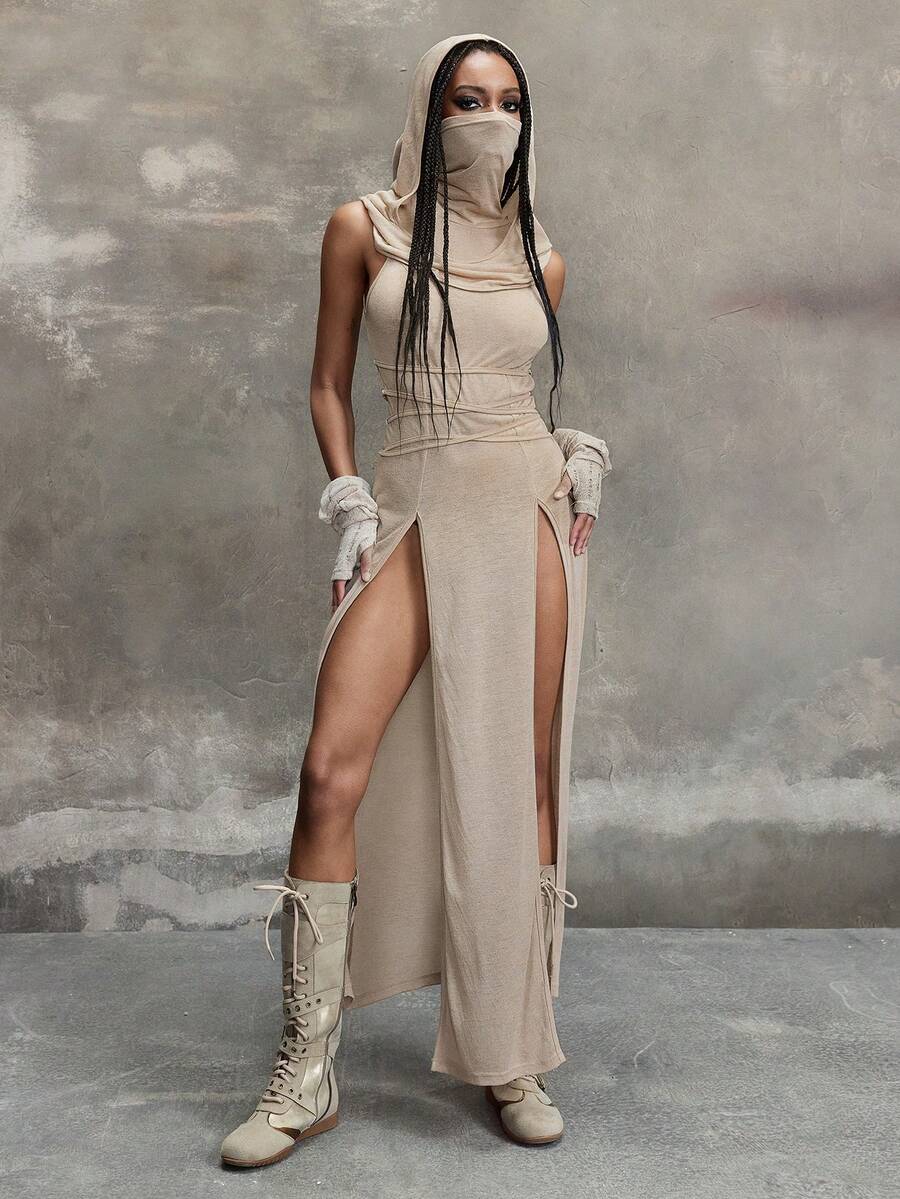 Women wearing a Y2K vintage apocalyptic style hooded long dress featuring short sleeves, backless detail, high thigh slit, and slim fit knitted fabric.
