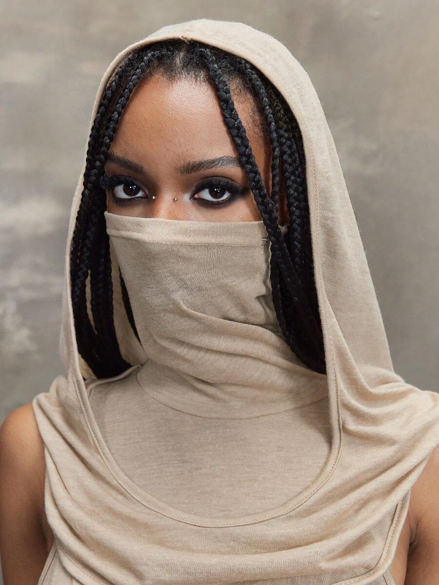 Women wearing a Y2K vintage apocalyptic style hooded long dress featuring short sleeves, backless detail, high thigh slit, and slim fit knitted fabric.