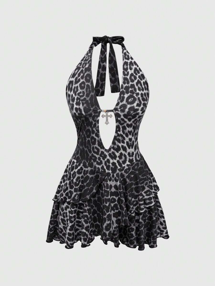 Women's burgundy halter leopard print mini dress featuring a backless cut-out design and tiered layered hem.