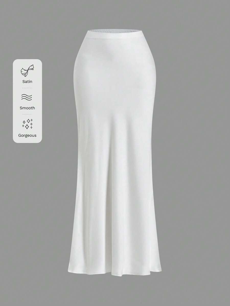 Women's black woven mermaid maxi skirt featuring a solid color design, mid waist, and 100% cotton fabric.