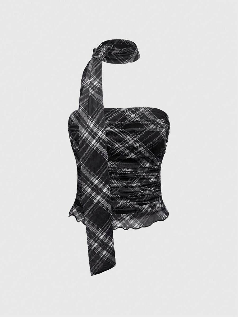 Women's black polka dot strapless tube top made of ruched mesh fabric featuring an asymmetrical hem and matching scarf.