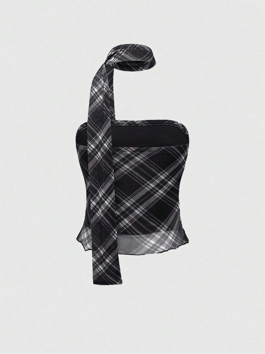 Women's black polka dot strapless tube top made of ruched mesh fabric featuring an asymmetrical hem and matching scarf.