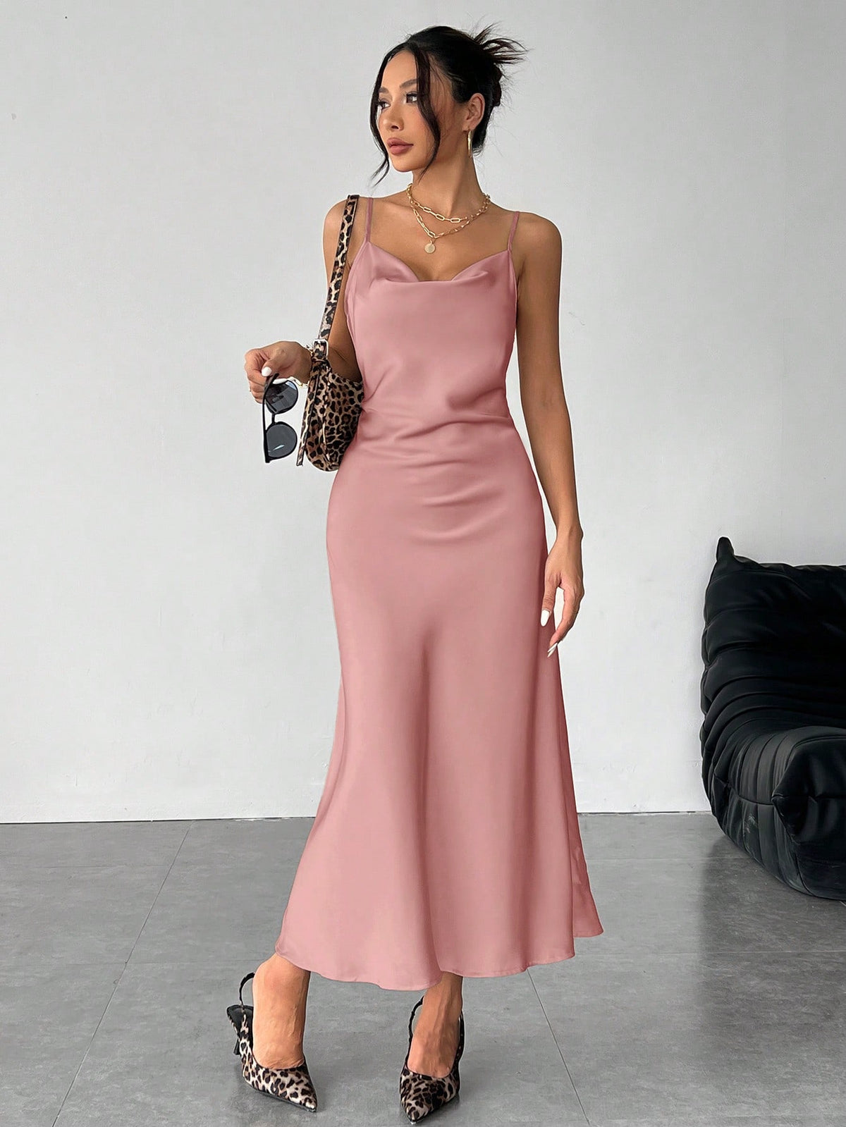 Women's long apricot satin cami dress featuring a draped swing collar, spaghetti straps, backless zipper back, and mermaid hem.