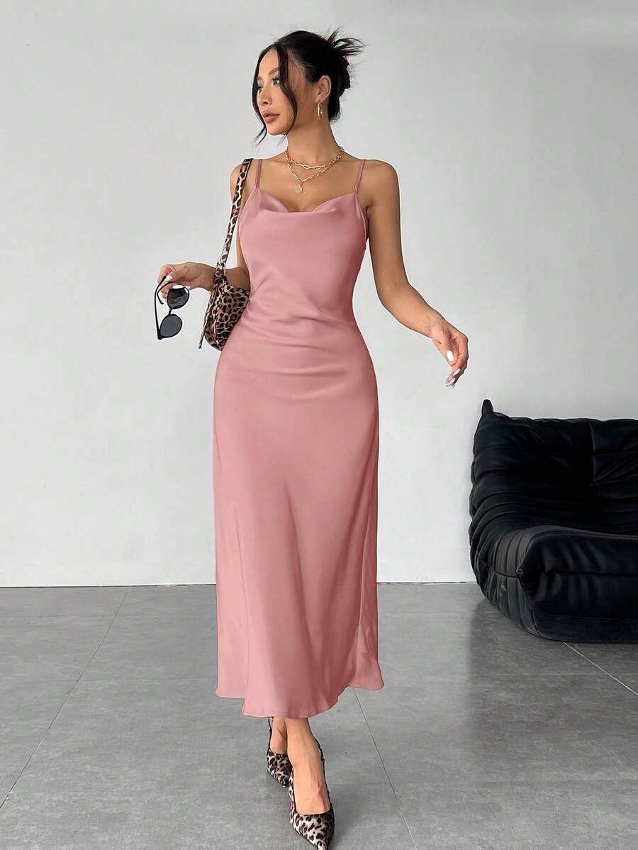 Women's long apricot satin cami dress featuring a draped swing collar, spaghetti straps, backless zipper back, and mermaid hem.