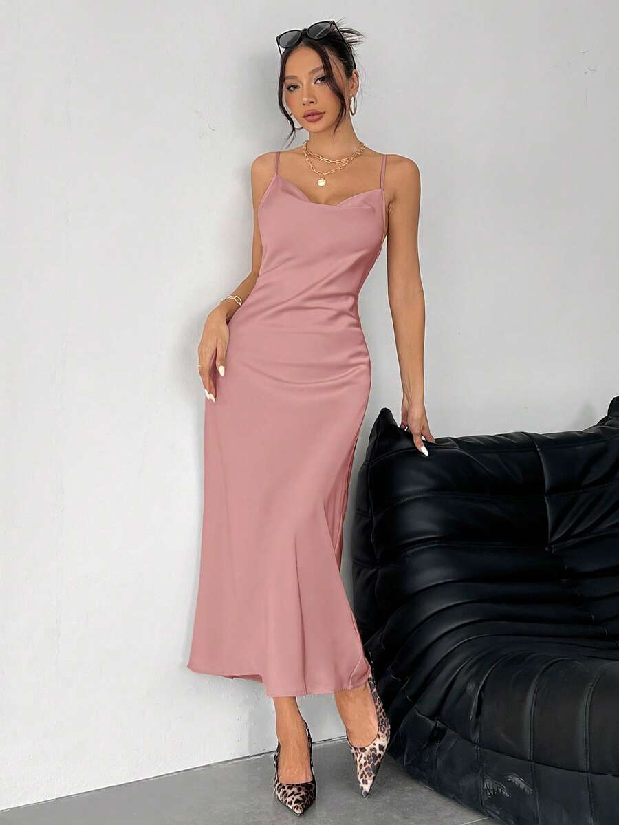 Women's long apricot satin cami dress featuring a draped swing collar, spaghetti straps, backless zipper back, and mermaid hem.