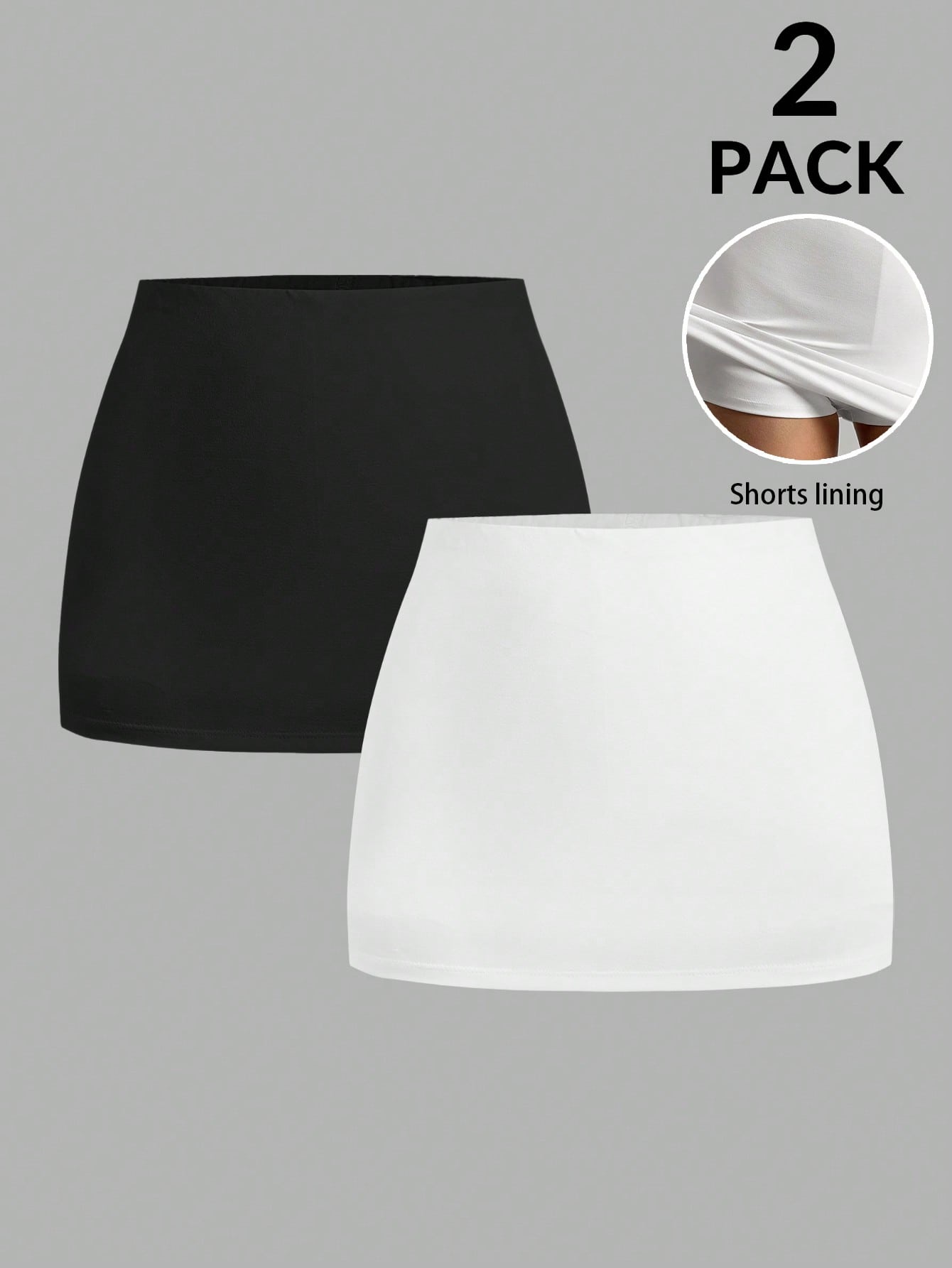 Women's black casual low rise bodycon mini skort with built-in shorts in knitted plain stretch fabric.