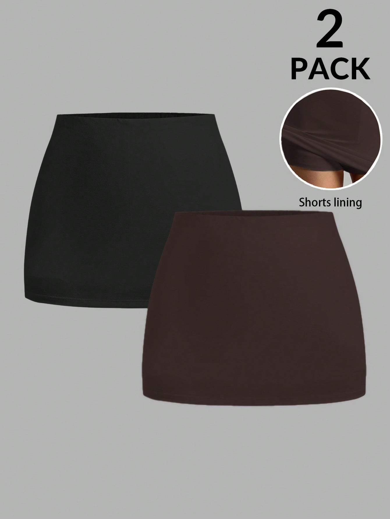 Women's black casual low rise bodycon mini skort with built-in shorts in knitted plain stretch fabric.
