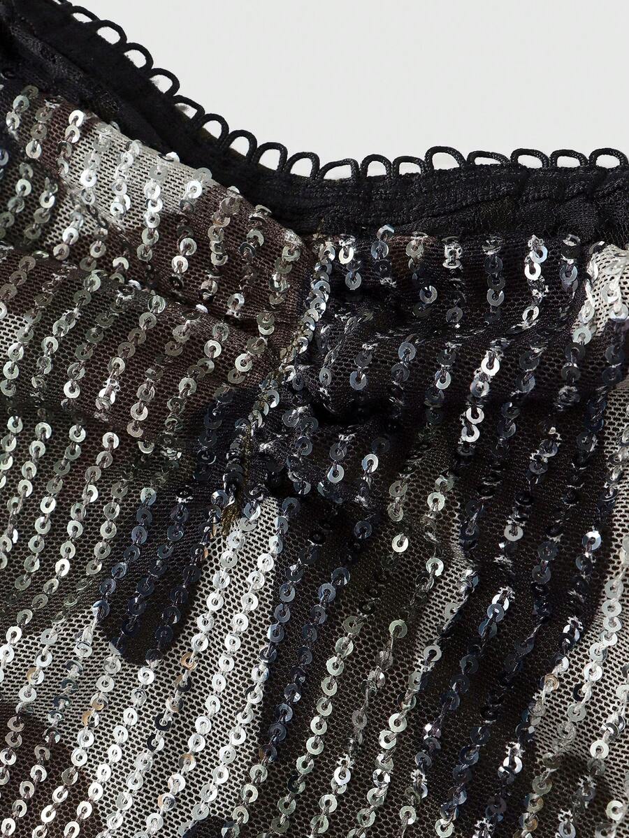 Women's camouflage print crop cami top with contrast sequin and lace splicing, spaghetti straps, zipper back, and matching arm sleeves.