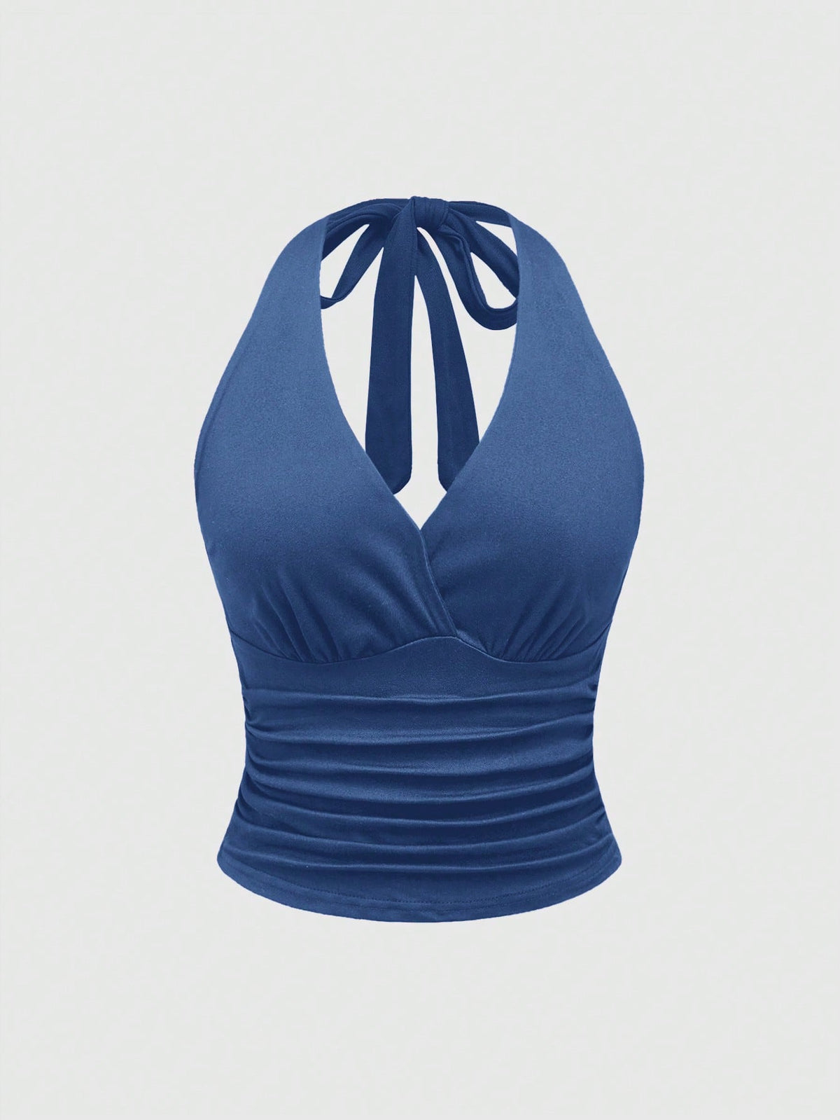 Women's halter crop tank top featuring a backless silhouette and ruched detailing in a slim fit design.
