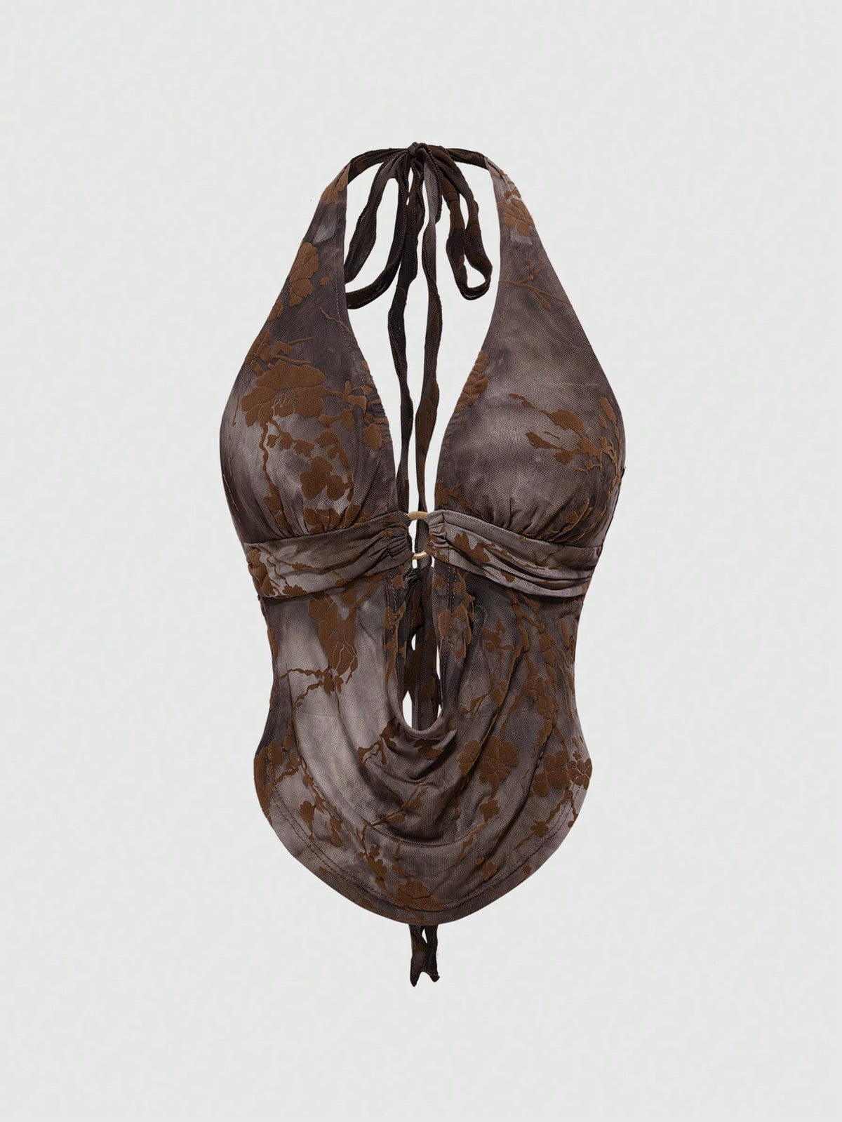 Brown tie dye halter crop top for women featuring a backless design, asymmetrical hem with ring detail, and flocked floral print.