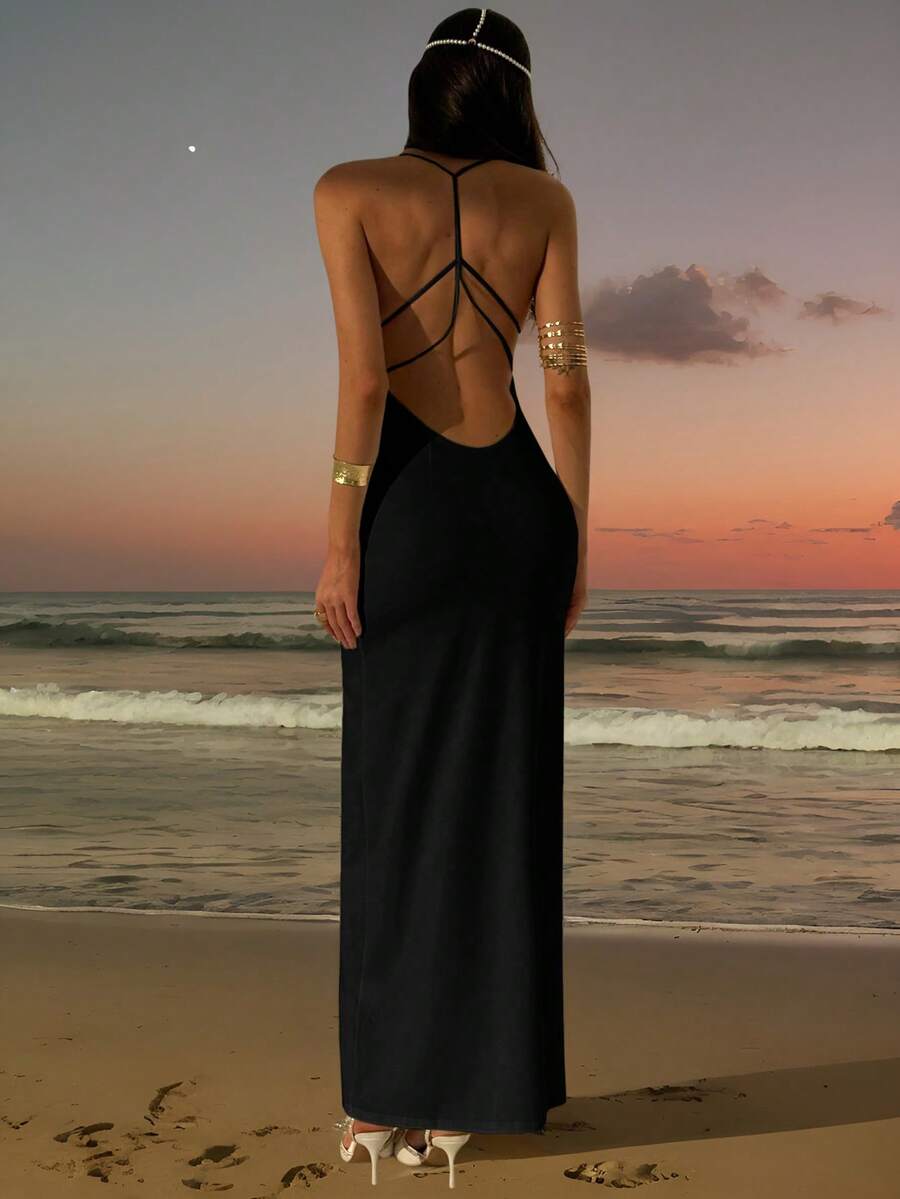 Slim fit backless halter maxi dress for women featuring criss-cross back details and spaghetti straps.