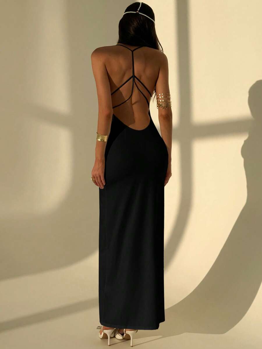 Slim fit backless halter maxi dress for women featuring criss-cross back details and spaghetti straps.