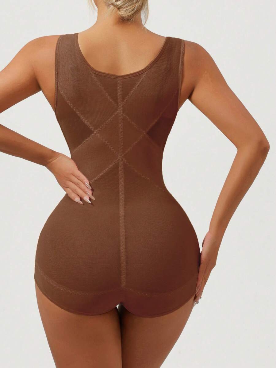Apricot semi-sheer mesh shapewear bodysuit for women featuring a low-cut neckline, bust support, contrast mesh details, and Bermuda shorts length.
