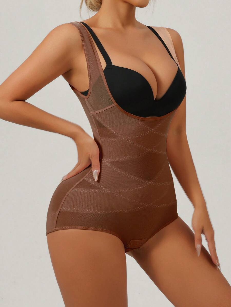 Apricot semi-sheer mesh shapewear bodysuit for women featuring a low-cut neckline, bust support, contrast mesh details, and Bermuda shorts length.