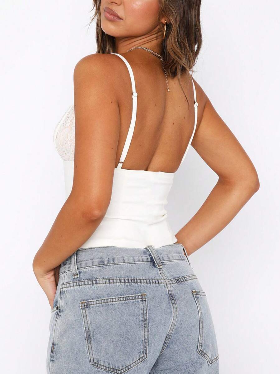 Women's V-neck backless camisole crop top with ruched detailing in a slim fit knit fabric.