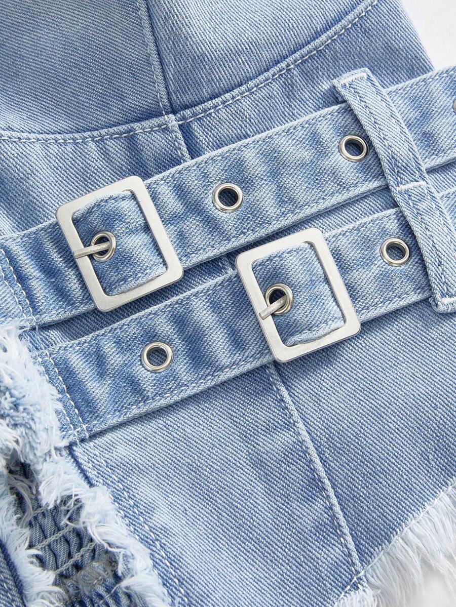 Women's denim halter crop top featuring a backless design, asymmetrical hem, single-breasted front, and lettuce trim.