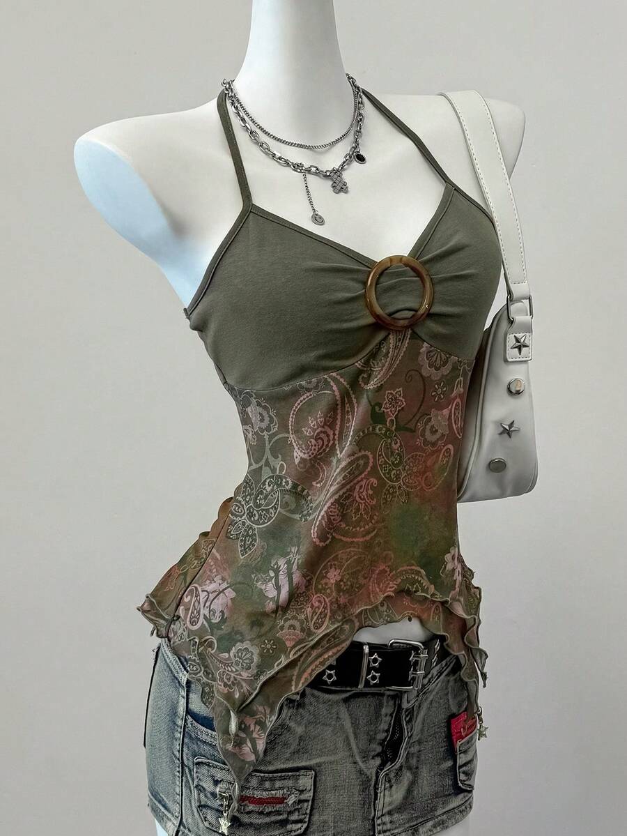 Women's backless halter cami top featuring a paisley print, sleeveless design, and an asymmetrical hem in knitted fabric.